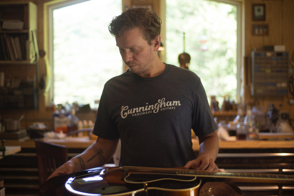 Luthier Jackson Cunningham of Cunningham Hand-Made Instruments makes archtop guitars and fiddles at his workshop in Troutdale, Virginia. Cunningham photographed on 9/3/16. Photo by Pat Jarrett/The Virginia Folklife Program